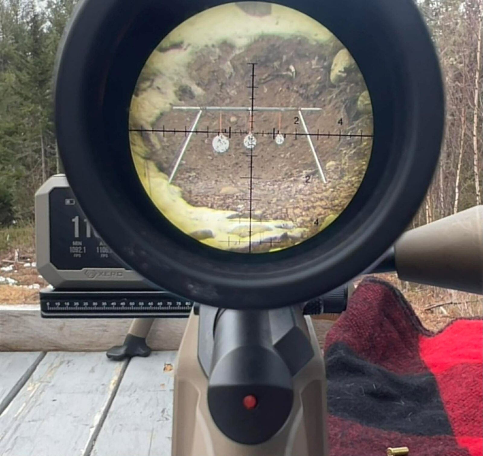 Through the scope at the gongs, 300 yards out